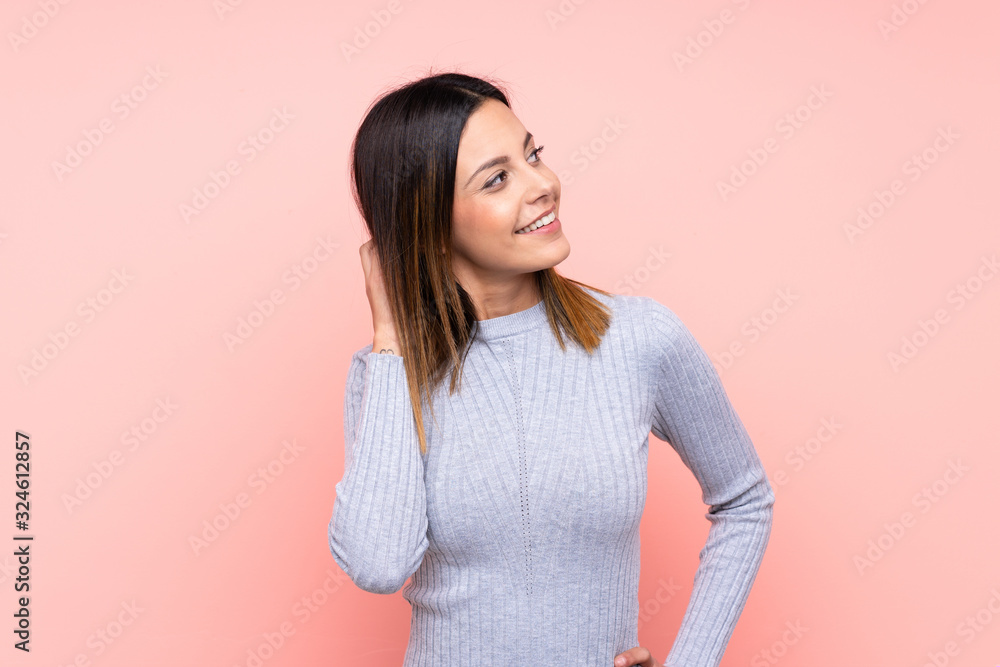 Woman over isolated pink background thinking an idea Woman over isolated pink background thinking an idea
