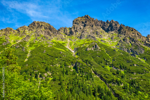 Panoramic view of the Seven Granats ridge - Siedem Granatow - within the Zabia Gran range over Rybi Potok Valley in Tatra Mountains, near Zakopane in Poland photo