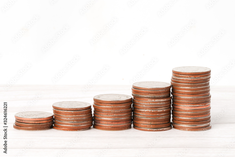 Stack of coins money more from salary payment income for office employee worker. Stack of coins money more from salary payment income for office employee worker.