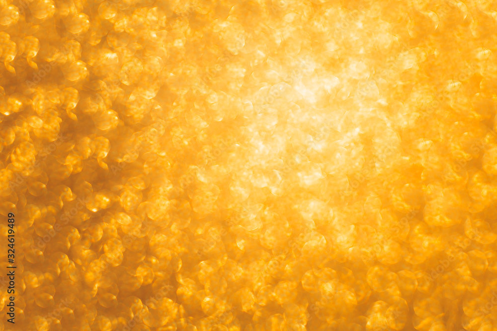 Abstract blurred gold sparkle bakground. Abstract blurred gold sparkle bakground.