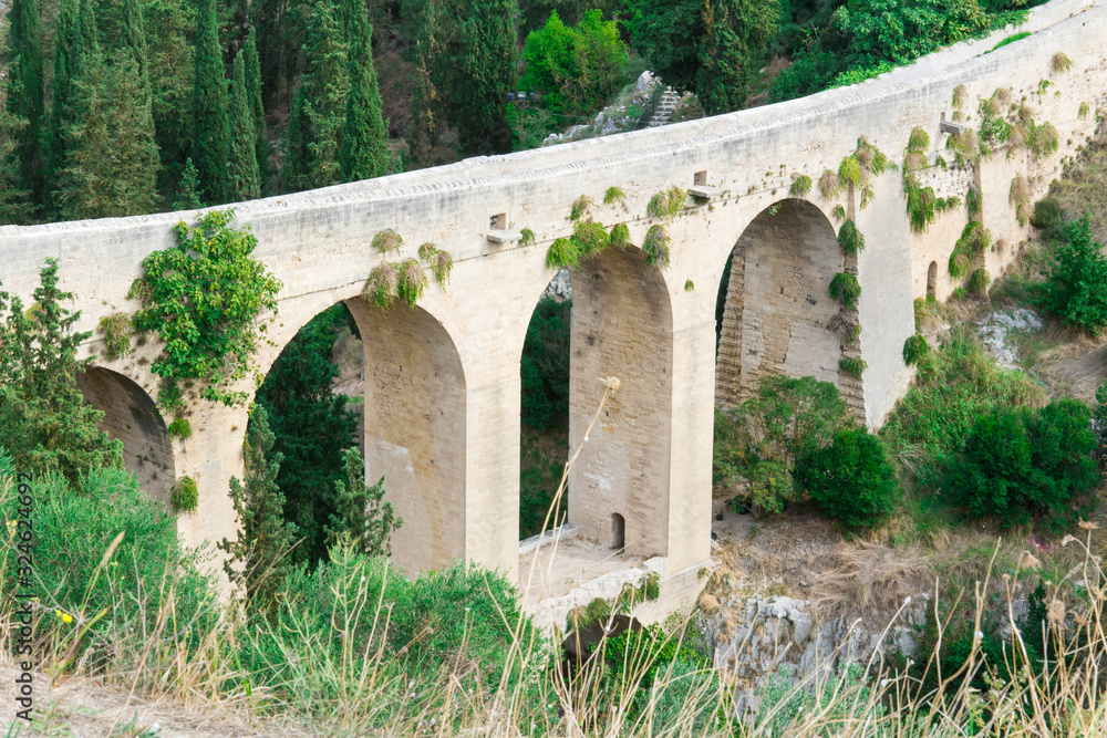 Two level roman bridge, aquaduct Madonna della Stelle. In historical town Gravina di Puglia, Italy