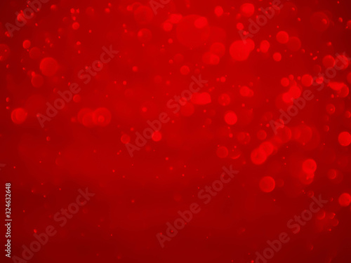 Ruby red bokeh background with soft blur bokeh light effect.