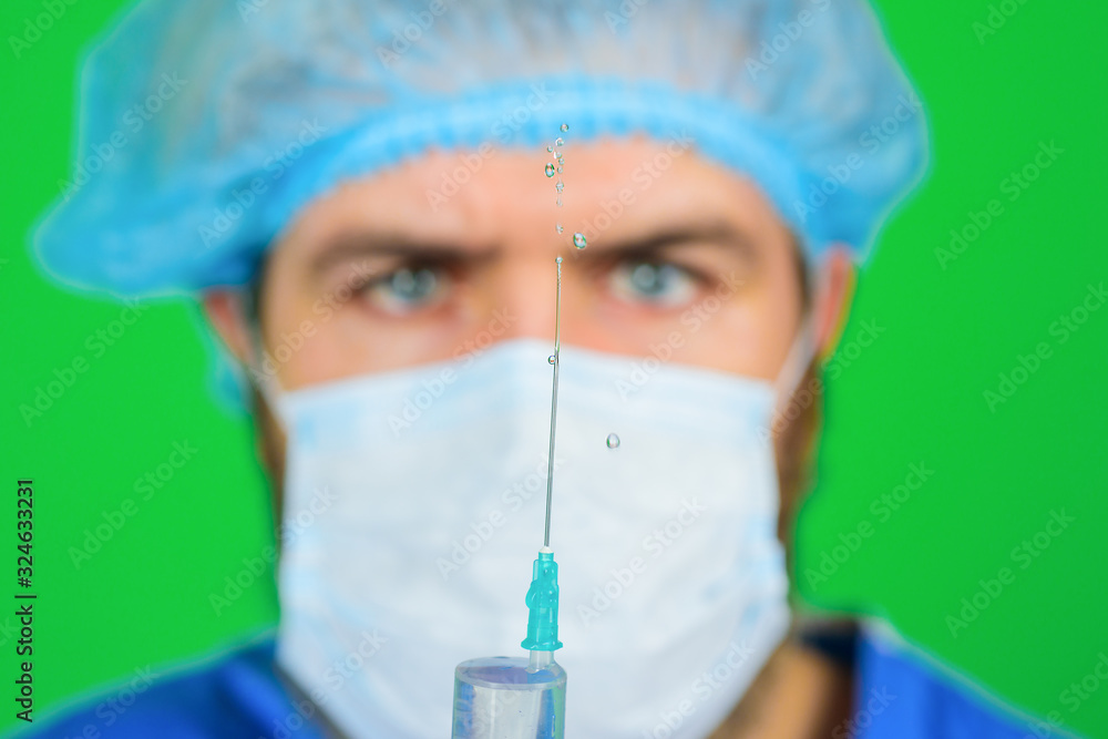 Vaccination for people. Injection. Doctor with syringe. Coronavirus. Doctor makes vaccination. Selective focus. Close up. Doctor with syringe. Medicine. Vaccination for people. Injection. Doctor with syringe. Coronavirus. Doctor makes vaccination. Selective focus. Close up. Doctor with syringe. Medicine.