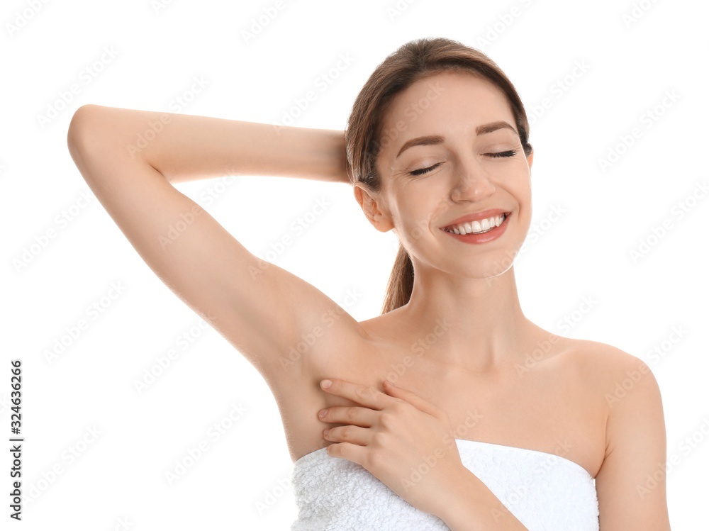 Young woman showing armpit with smooth clean skin on white background Young woman showing armpit with smooth clean skin on white background