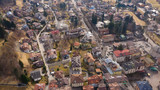 Ariel view of city consisting of large number of small houses and some greenery around it beautiful landscape.