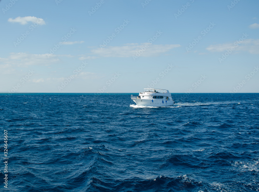 Red Sea Egypt. White motor yacht sailing on the sea