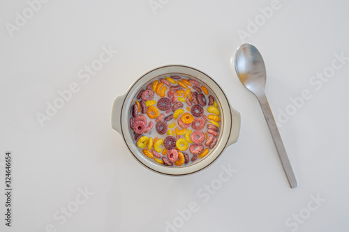 Colourful Cereals for breakfast on white background