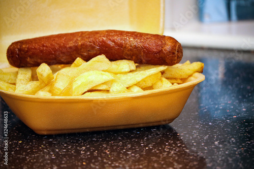 Sausage and chips from a takeaway