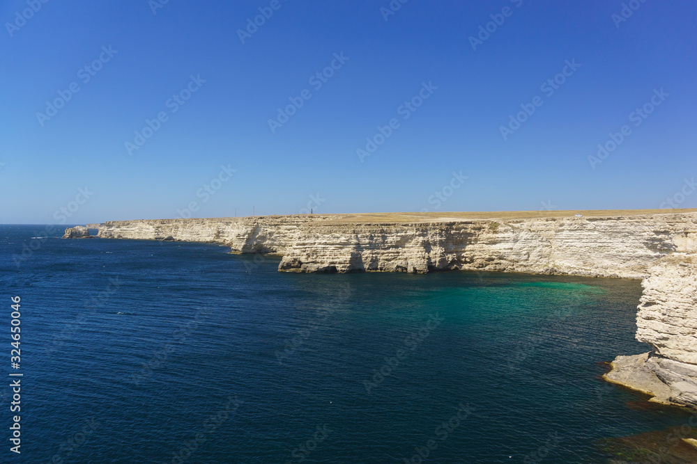 Obraz premium Blue landscape of the coastline of the Tarkhankut Peninsula in Crimea. The laconic nature