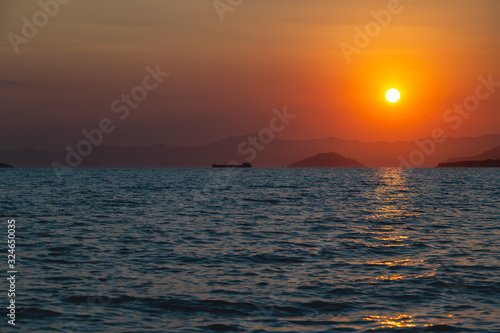 Sunset on the Calis Beach on the Aegean Sea