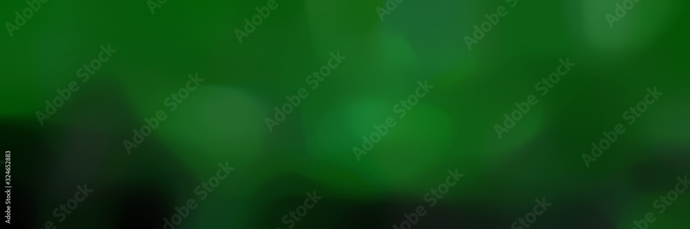 soft blurred landscape format background texture with green, very dark green and forest green colors space for text or image soft blurred landscape format background texture with green, very dark green and forest green colors space for text or image