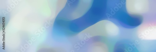 Fototapeta Naklejka Na Ścianę i Meble -  blurred bokeh landscape format background with pastel blue, steel blue and cadet blue colors and free text space