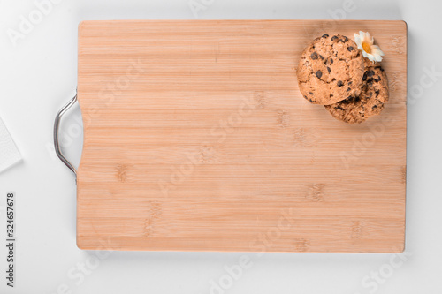 Cookies in the corner of a wooden board