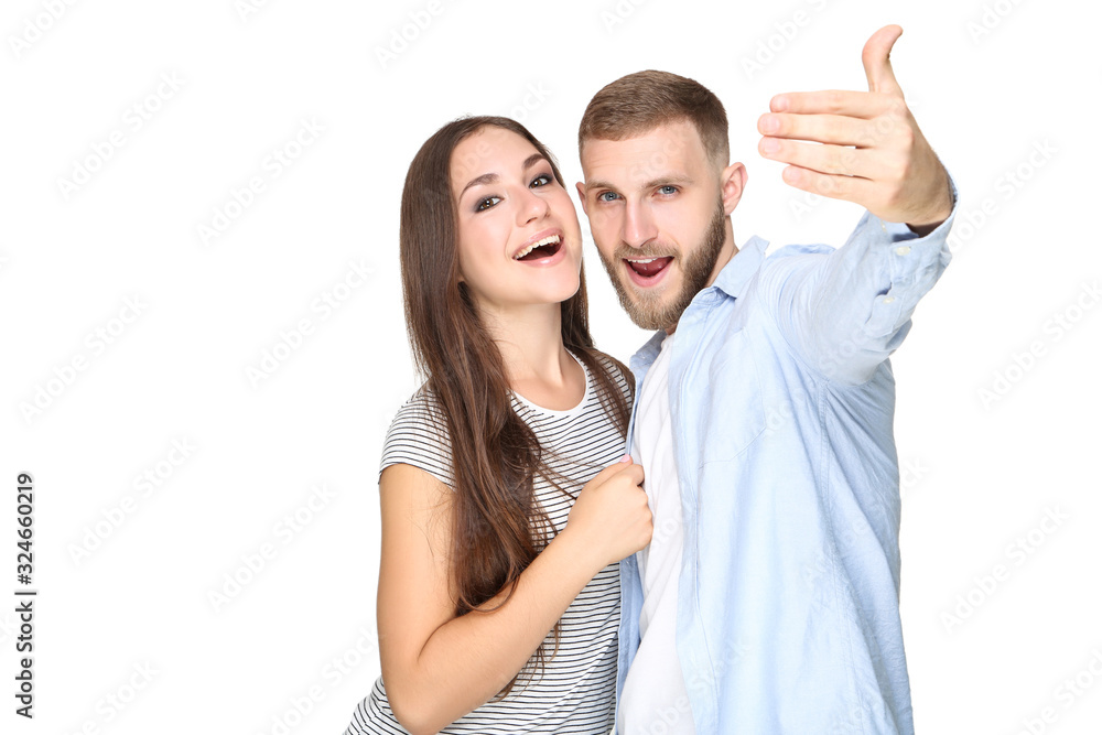 Happy young couple on white background Happy young couple on white background