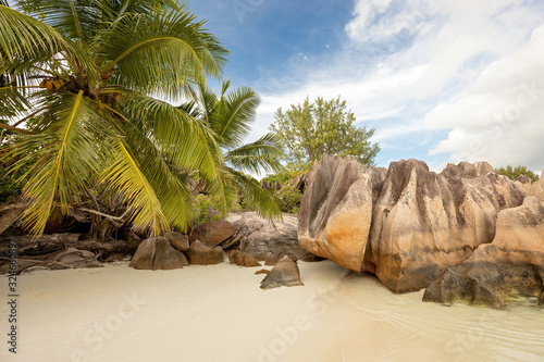 Curiouse Island and beautiful beach with granite stones in the Seychelles