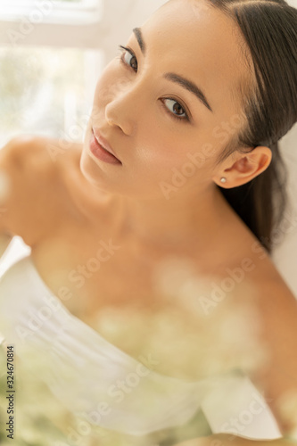 Portrait of pretty woman that looking at camera