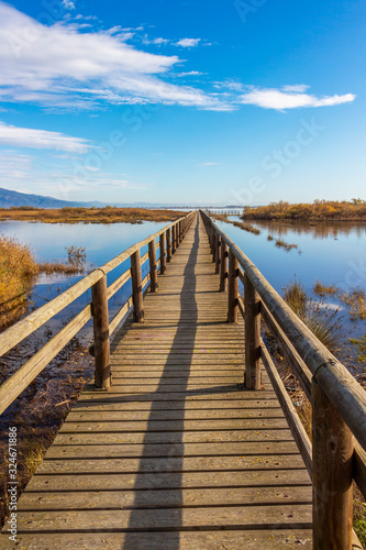 Nature wooden boardwalk in Lake Vistonida  Porto Lagos  Xanthi regional unit  Greece on a sunny winter day