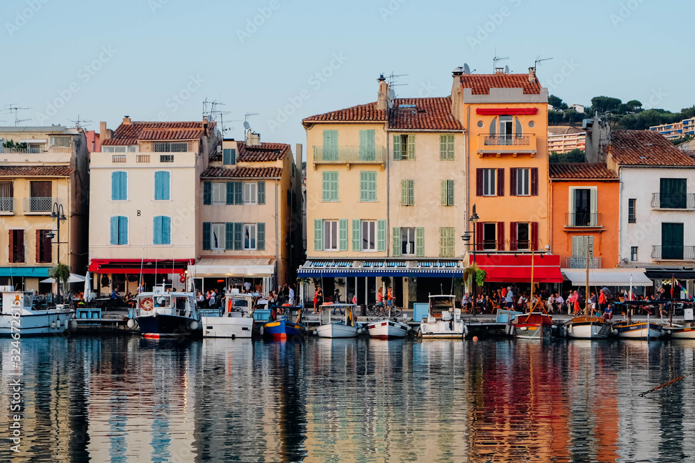 Colorful buildings and boats in the port of Cassis, France.