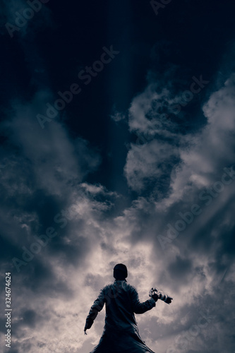 Man faces the sunset in dramatic portrait © Luke