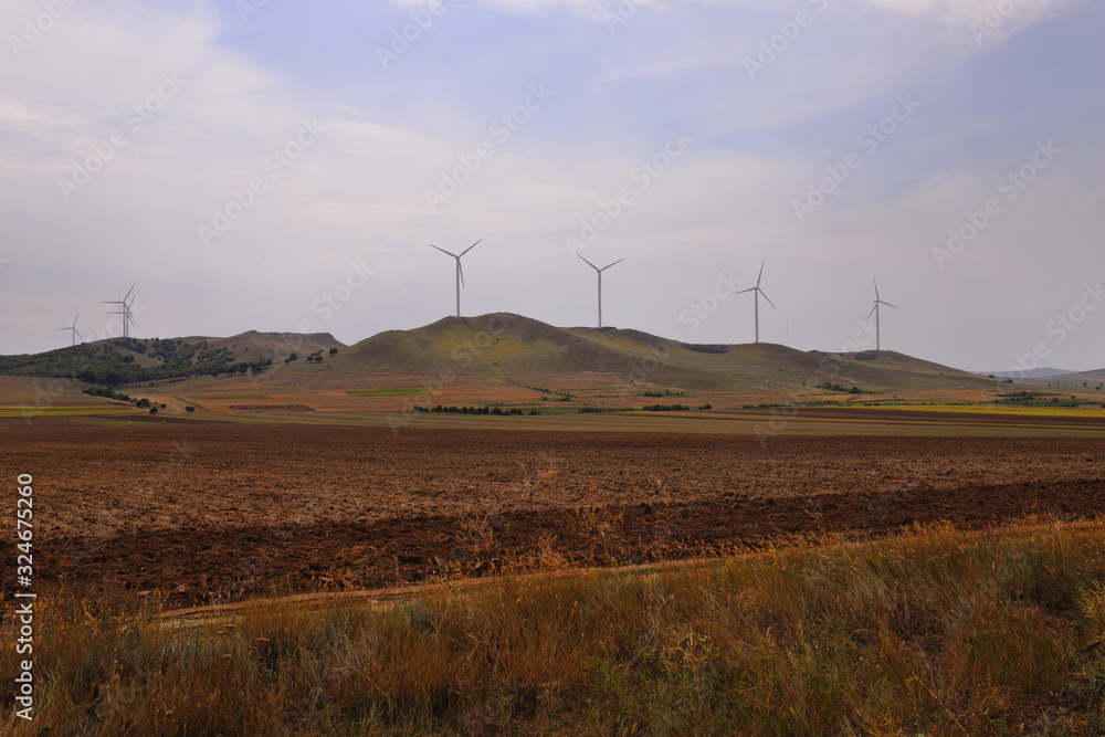 Wind farm at the Măcin Mountains in Romania Wind farm at the Măcin Mountains in Romania