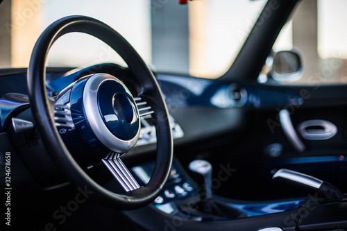 Direction wheel of a black car © azerbaijan-stockers
