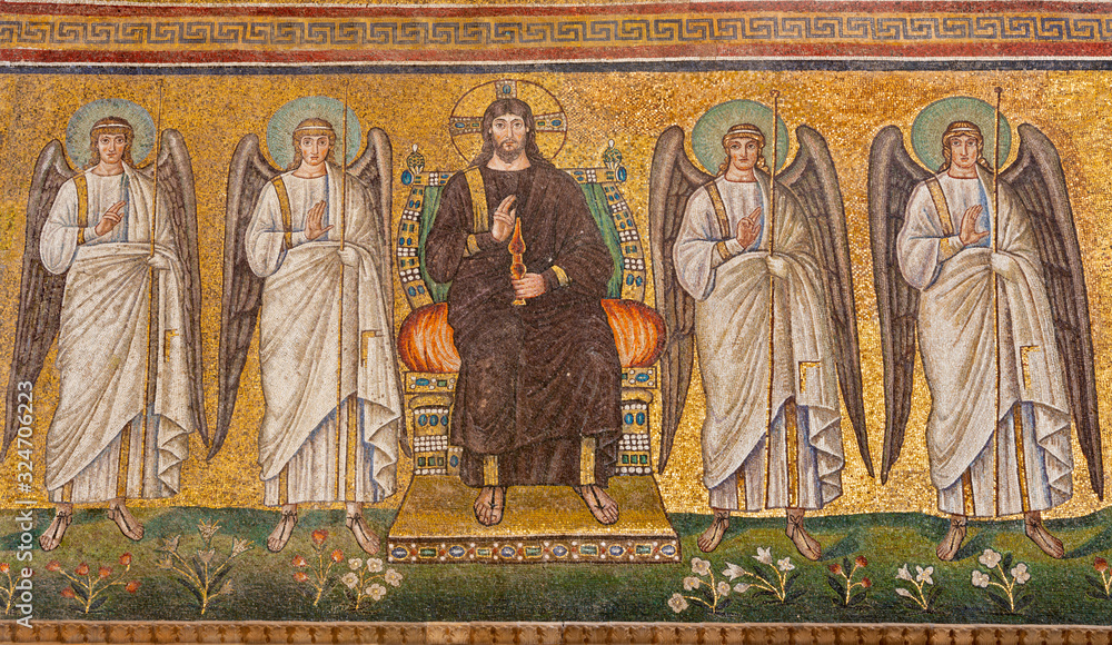 RAVENNA, ITALY - JANUARY 28, 2020: The mosaic of Jesus Christ on the throne the angels from church Basilica of Sant Apolinare Nuovo from the 6. cent.