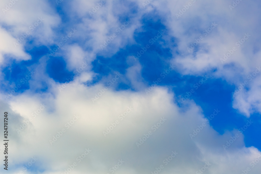 Blue sky with cloud background. With copy space for text or design. Blue sky with cloud background. With copy space for text or design.