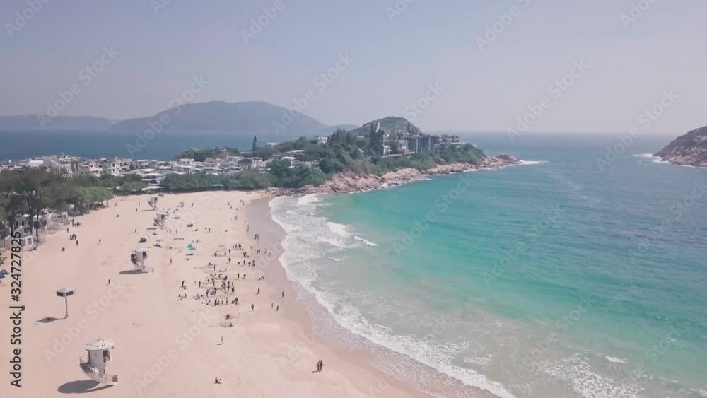Tropical, beautiful Shek O Beach, a white sandy stretch of sand in Hong Kong Island. Aerial drone view Tropical, beautiful Shek O Beach, a white sandy stretch of sand in Hong Kong Island. Aerial drone view