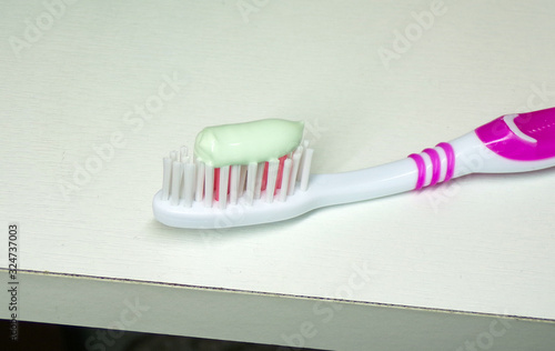 Toothbrush with toothpaste for cleaning teeth. Hygiene brush your teeth. Compliance with hygiene rules brushing your teeth every day. Healthy teeth.