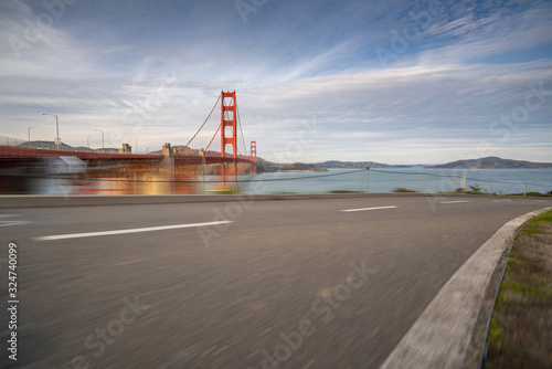 blurred highway in the background of golden gate bridge