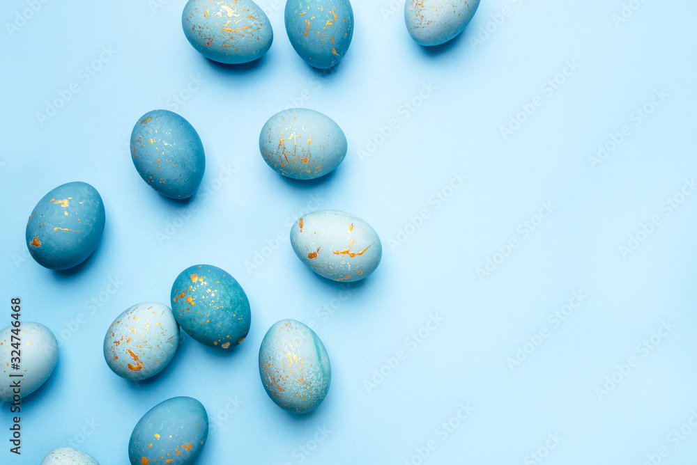 Easter frame of eggs painted in blue color. Flat lay, top view. Copy space for text. Easter frame of eggs painted in blue color. Flat lay, top view. Copy space for text.