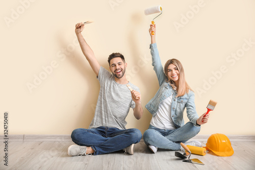 Young couple with tools res...