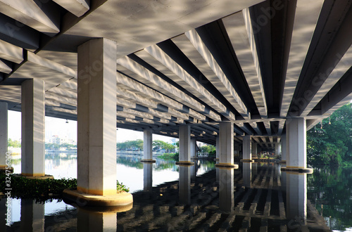 фотографія Amazing scene under bridge with reflection wonderful shadow, shape, lines, curve