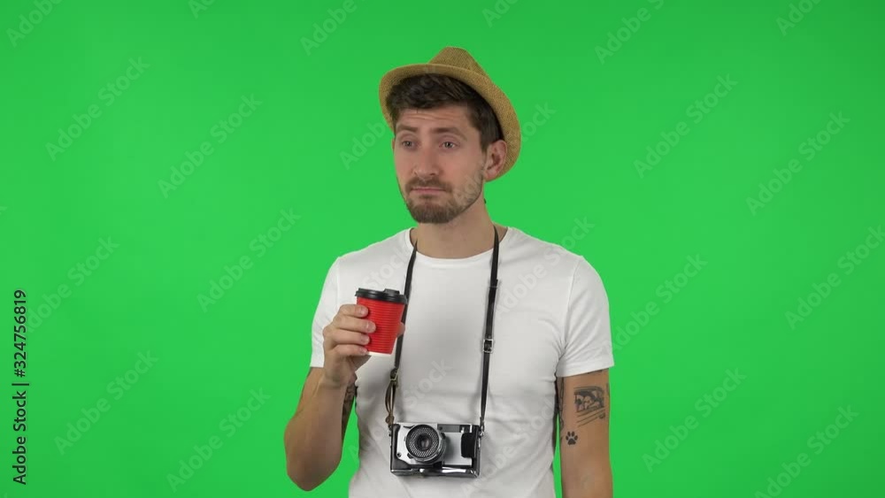 Portrait of confident guy is enjoying coffee. Green screen Portrait of confident guy is enjoying coffee. Green screen