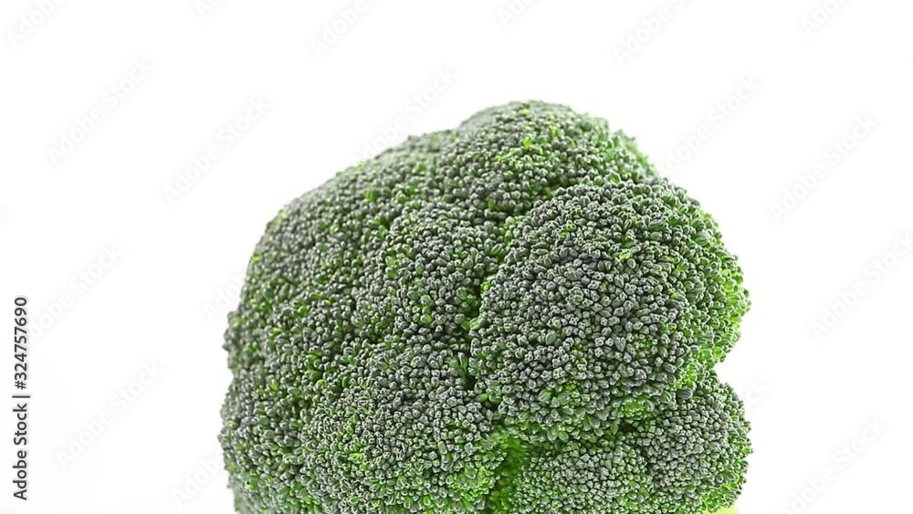 Broccoli cabbage rotates, branch of inflorescence lying on its side, fresh green vegetable. Broccoli cabbage rotates, branch of inflorescence lying on its side, fresh green vegetable.