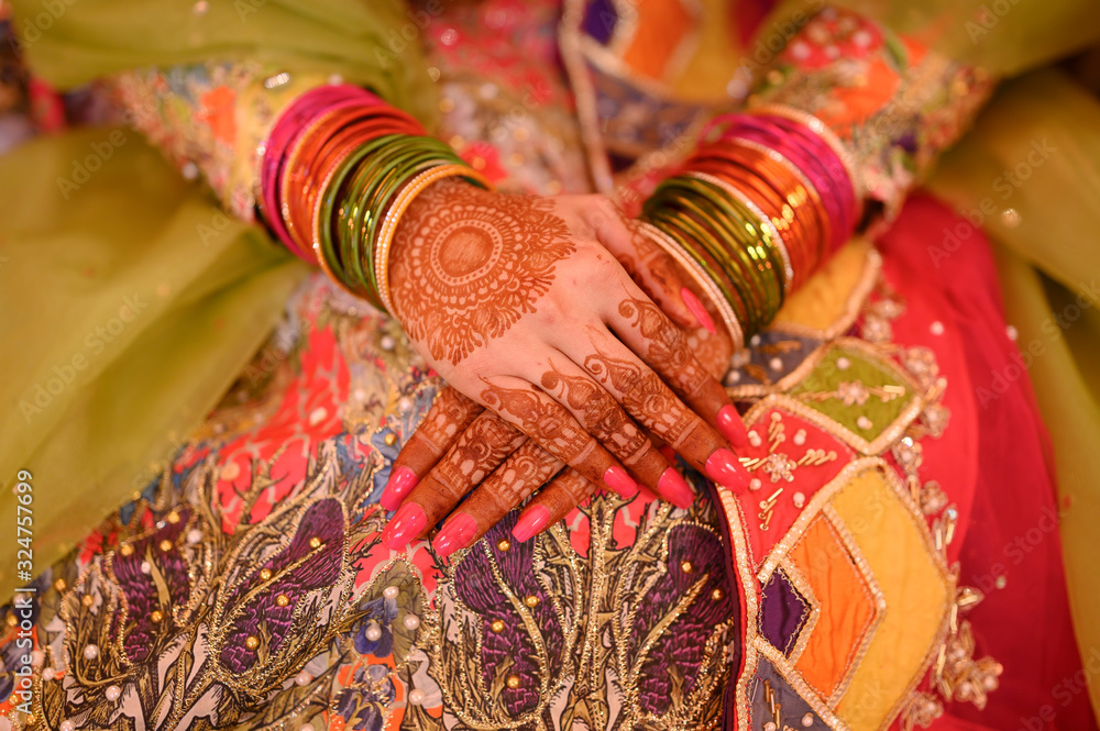 Popular mehndi Design on hands of bride 
