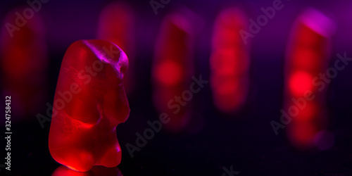 red marmalade bears on a black background photo