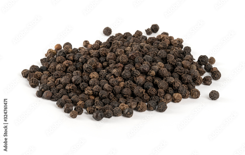 Heap of raw, natural, unprocessed black pepper peppercorns over white background Heap of raw, natural, unprocessed black pepper peppercorns over white background