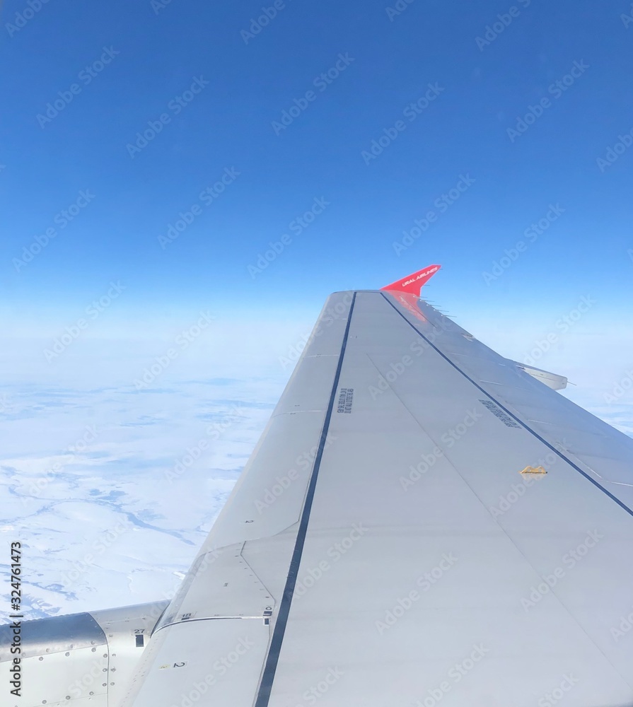 Photo was taken out of a plane window directly over the wing.