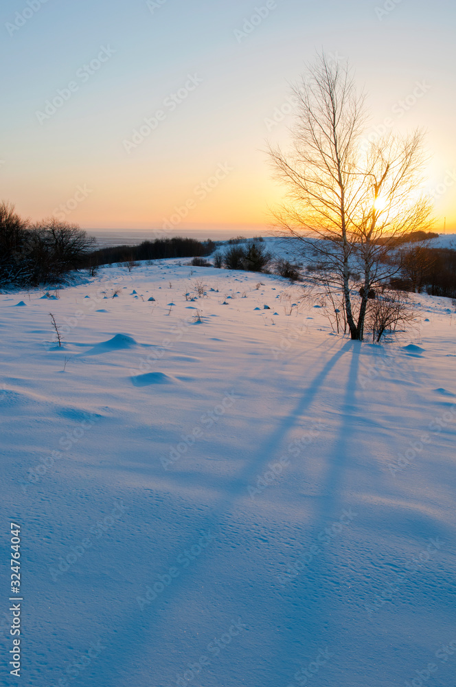 sunrise in the winter mountains on a sunny day