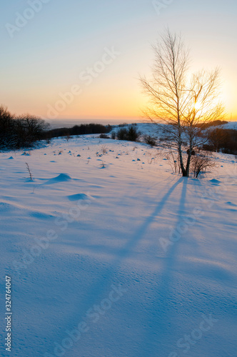 sunrise in the winter mountains on a sunny day