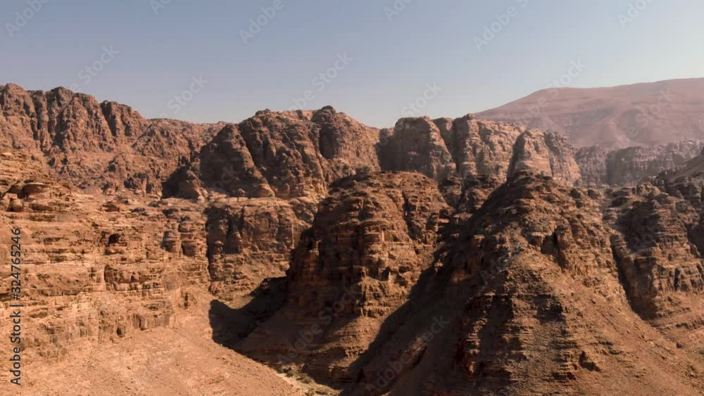 Epic aerial drone shot from above valley and rocky hill tops in Jordan, Dana Epic aerial drone shot from above valley and rocky hill tops in Jordan, Dana