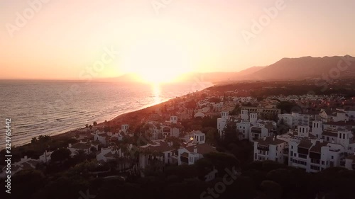 Drone flight sunset over Marbella Spain photo