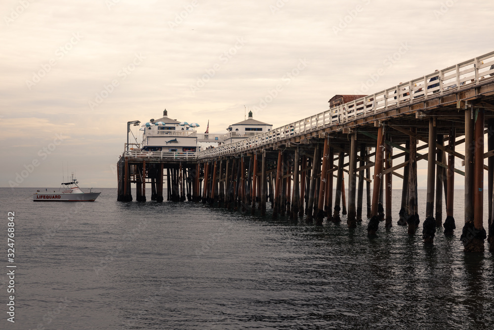 Malibu Beach pier in the coast of California, United States.