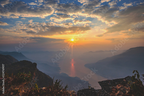 sunset in the mountains on the top view of higher mountain in Thailand