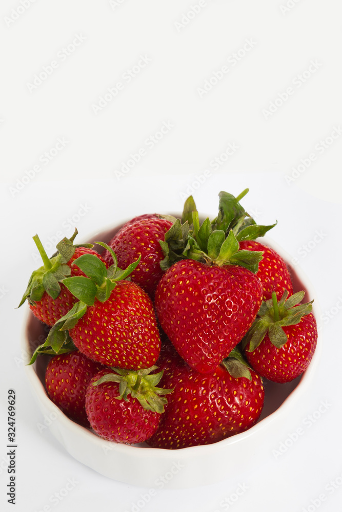 bowl with strawberries isolated on white background bowl with strawberries isolated on white background