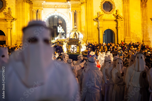 Fotografie Christian brethren during the traditional Good Friday procession, Leonforte