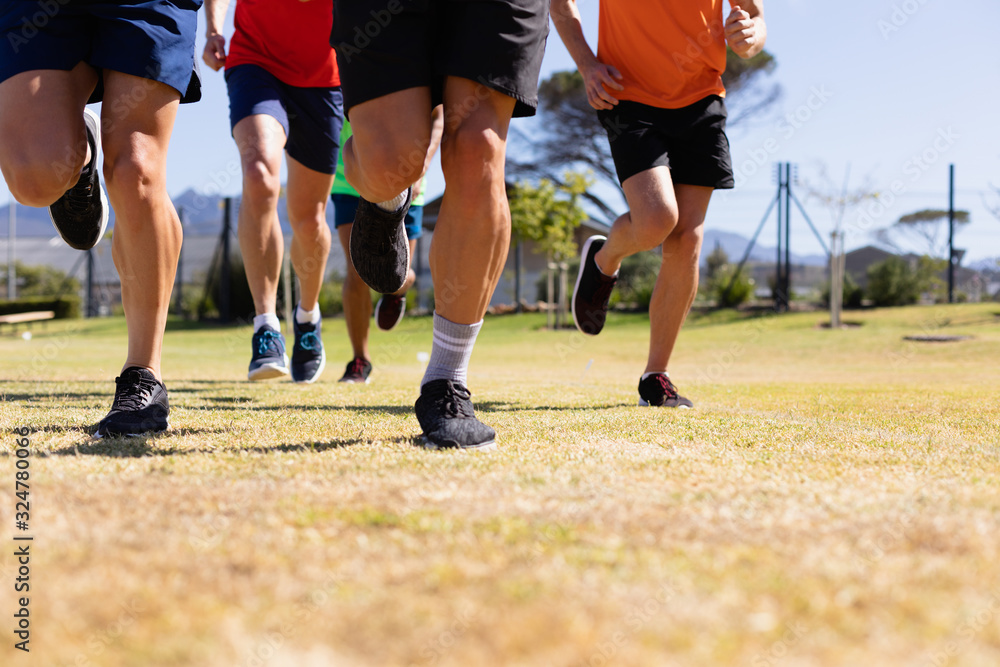 Men running to train
