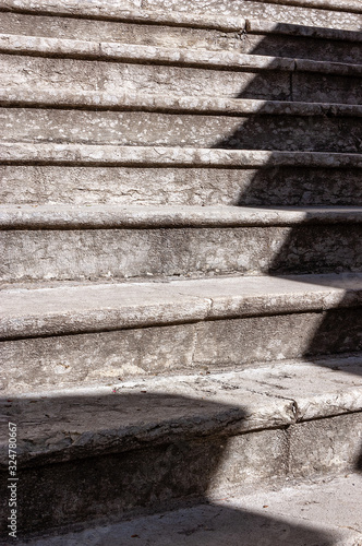 Extreme close up of a staircase with old stone steps - Background