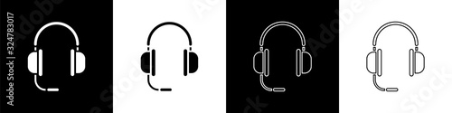 Set Headphones with microphone icon isolated on black and white background. Vector Illustration
